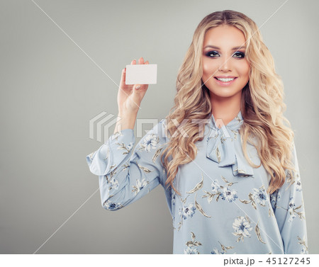 Happy successful woman holding credit card 45127245