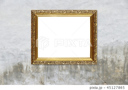 Antique golden picture photo frame on grey wall 45127865