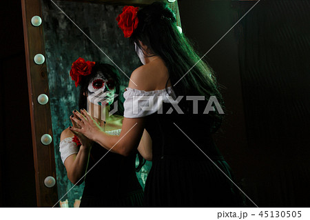 Halloween picture of female witch with makeup 45130505