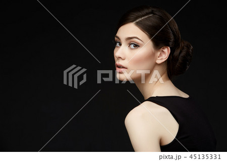 beautiful girl with hairdo on balck background 45135331