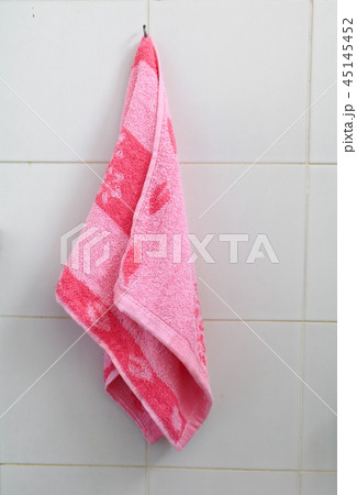 red towel for wipe hand in toliet room on wall 45145452
