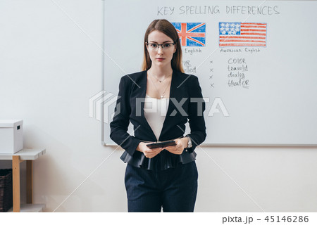 Female teacher looking at camera. English language school. 45146286