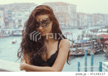 Woman with carnival mask in Venice 45148137