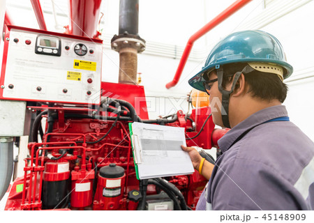 Engineer checking generator fire control system 45148909
