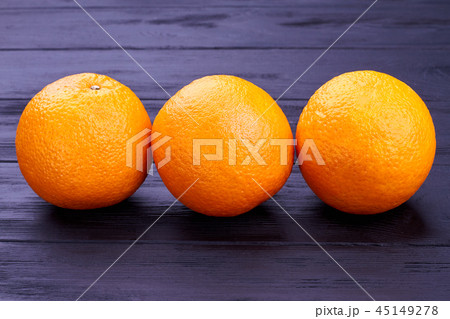 Three healthy orange fruits. 45149278