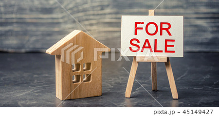 wooden house and dollars with the inscription wooden house and dollars with the inscription 45149427