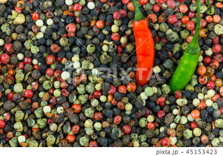mix of spicy white fresh pink black peppercorns 45153423