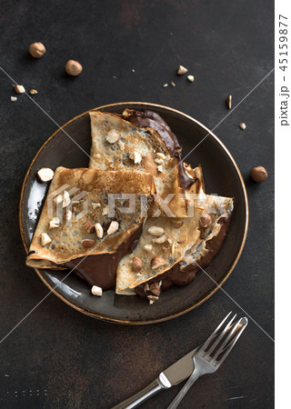 Crepes with chocolate 45159877