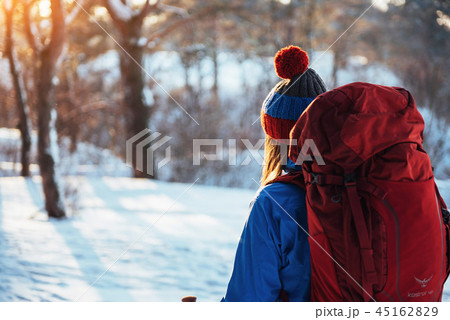 Woman Traveler with backpack hiking Travel Lifestyle adventure concept active vacations outdoor Woman Traveler with backpack hiking Travel Lifestyle adventure concept active vacations outdoor 45162829
