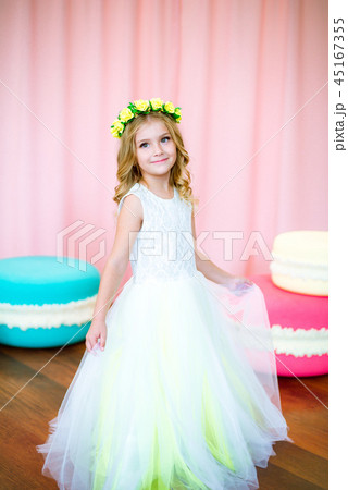 Cute little girl  with giant sweets 45167355