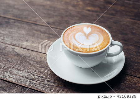 Close up white coffee cup with heart latte art Close up white coffee cup with heart latte art 45169339
