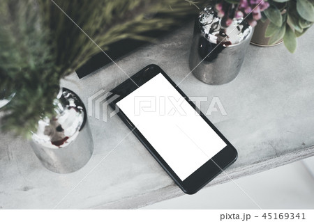 top view blank white screen mobile on table 45169341