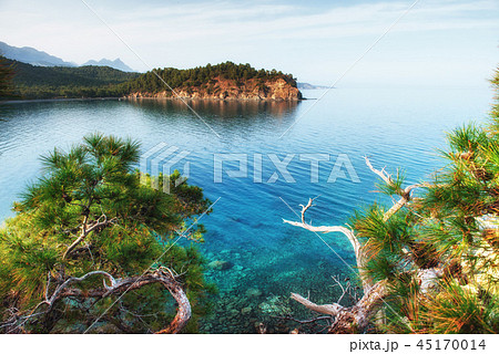 blue sea wave of mediterranean on turkish coast in the eveni blue sea wave of mediterranean on turkish coast in the eveni 45170014