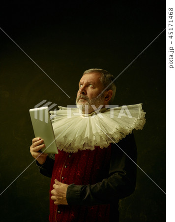 Official portrait of historical governor from the golden age. Studio shot against dark wall. Official portrait of historical governor from the golden age. Studio shot against dark wall. 45171468
