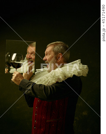 Official portrait of historical governor from the golden age. Studio shot against dark wall. Official portrait of historical governor from the golden age. Studio shot against dark wall. 45171490