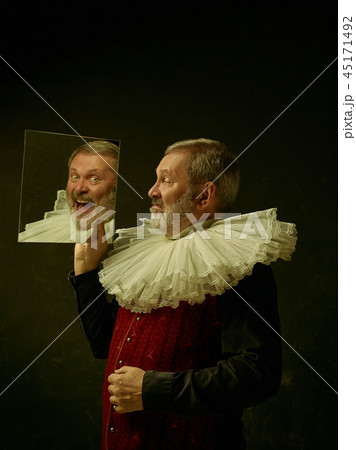 Official portrait of historical governor from the golden age. Studio shot against dark wall. Official portrait of historical governor from the golden age. Studio shot against dark wall. 45171492
