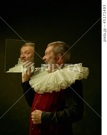 Official portrait of historical governor from the golden age. Studio shot against dark wall. Official portrait of historical governor from the golden age. Studio shot against dark wall. 45171493