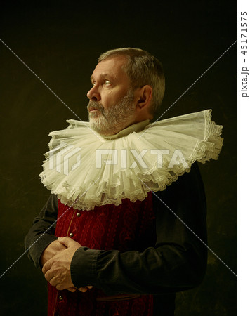 Official portrait of historical governor from the golden age. Studio shot against dark wall. Official portrait of historical governor from the golden age. Studio shot against dark wall. 45171575
