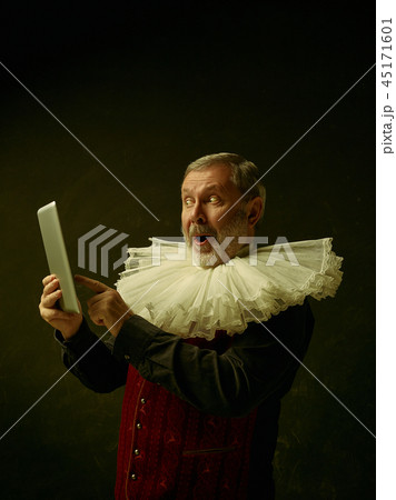 Official portrait of historical governor from the golden age. Studio shot against dark wall. Official portrait of historical governor from the golden age. Studio shot against dark wall. 45171601