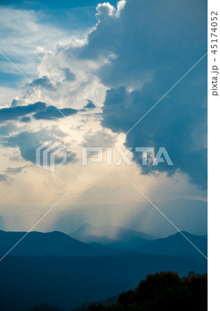 Top view of the mountain overlapping with clouds Top view of the mountain overlapping with clouds 45174052