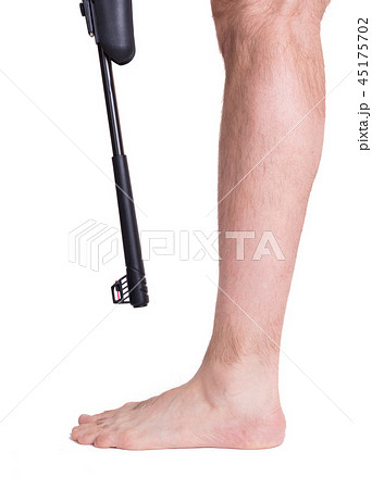 Man shooting himself in the foot 45175702