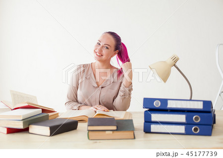 woman with pink hair works in the Office business training woman with pink hair works in the Office business training 45177739