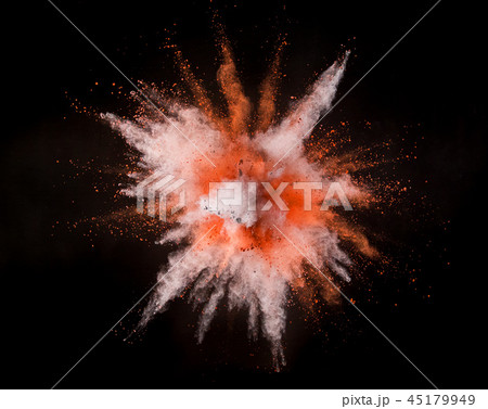 Colored powder explosion on black background. 45179949