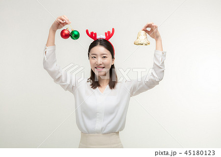 Christmas Day. Korea woman holding xmas props 45180123