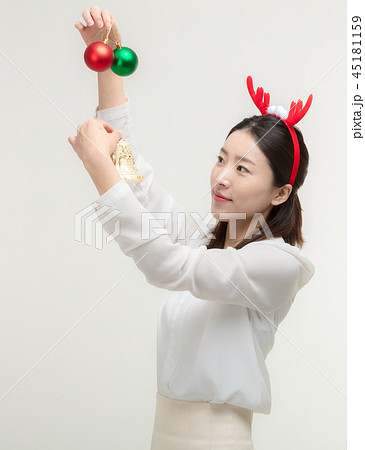Christmas Day. Korea woman holding xmas props 45181159