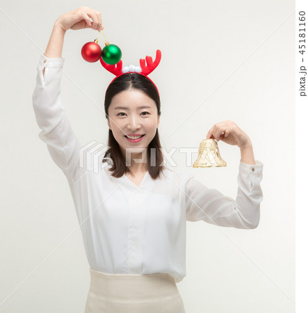 Christmas Day. Korea woman holding xmas props 45181160