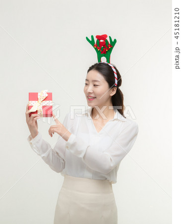 Christmas Day. Korea woman holding xmas props 45181210