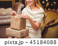 Blonde near the Christmas tree 45184088