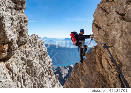 Male mountain climber on a Via Ferrata  45185701
