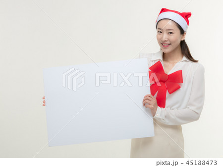 Christmas Day. Korea woman holding a white card 45188473