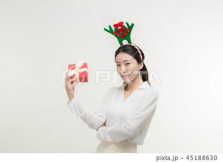Christmas Day. Korea woman holding xmas props 45188630