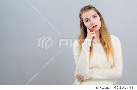 Young woman in a thoughtful pose 45191743