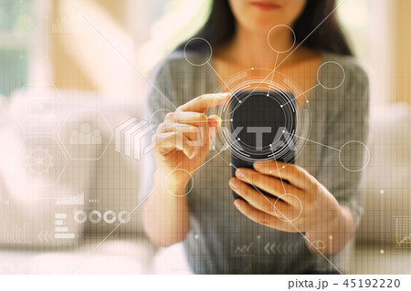 Tech circle with woman using a smartphone 45192220