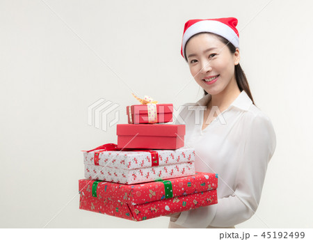 Christmas Day. Korea woman holding xmas props 45192499