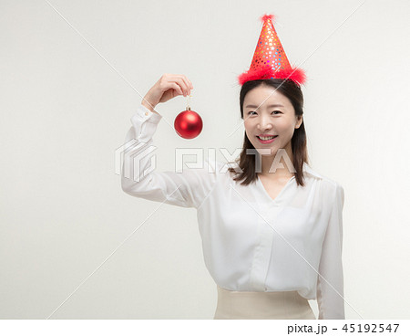 Christmas Day. Korea woman holding xmas props 45192547