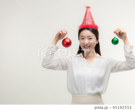 Christmas Day. Korea woman holding xmas props 45192553