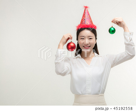 Christmas Day. Korea woman holding xmas props 45192558