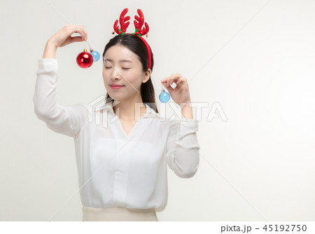 Christmas Day. Korea woman holding xmas props 45192750