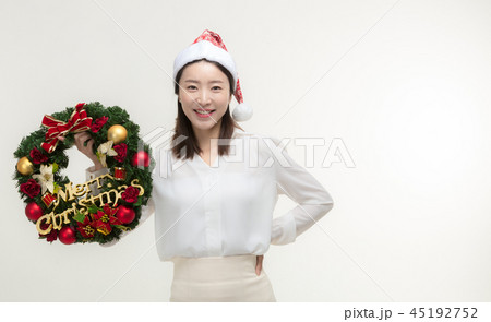 Christmas Day. Korea woman holding xmas props 45192752