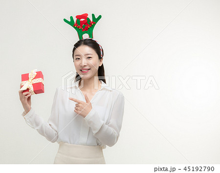 Christmas Day. Korea woman holding xmas props 45192790