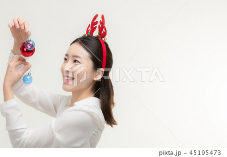 Christmas Day. Korea woman holding xmas props 45195473