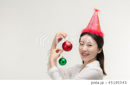 Christmas Day. Korea woman holding xmas props 45195543