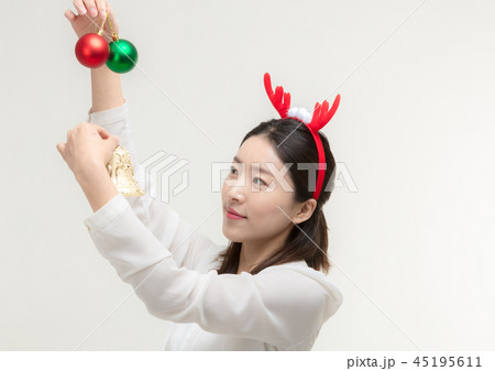 Christmas Day. Korea woman holding xmas props 45195611