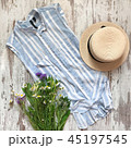 Women's striped shirt on a wooden background 45197545