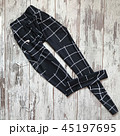 Sporting leggings on a wooden background 45197695