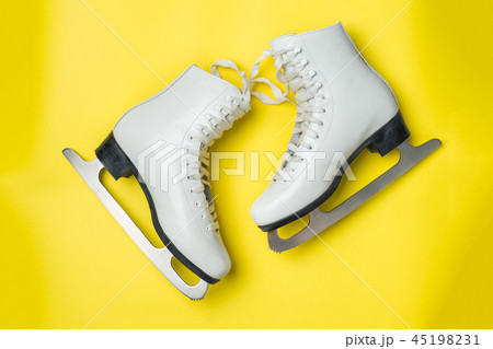 Concept winter holidays. White figure skates  45198231